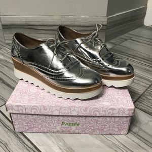 Silver platform sneakers.